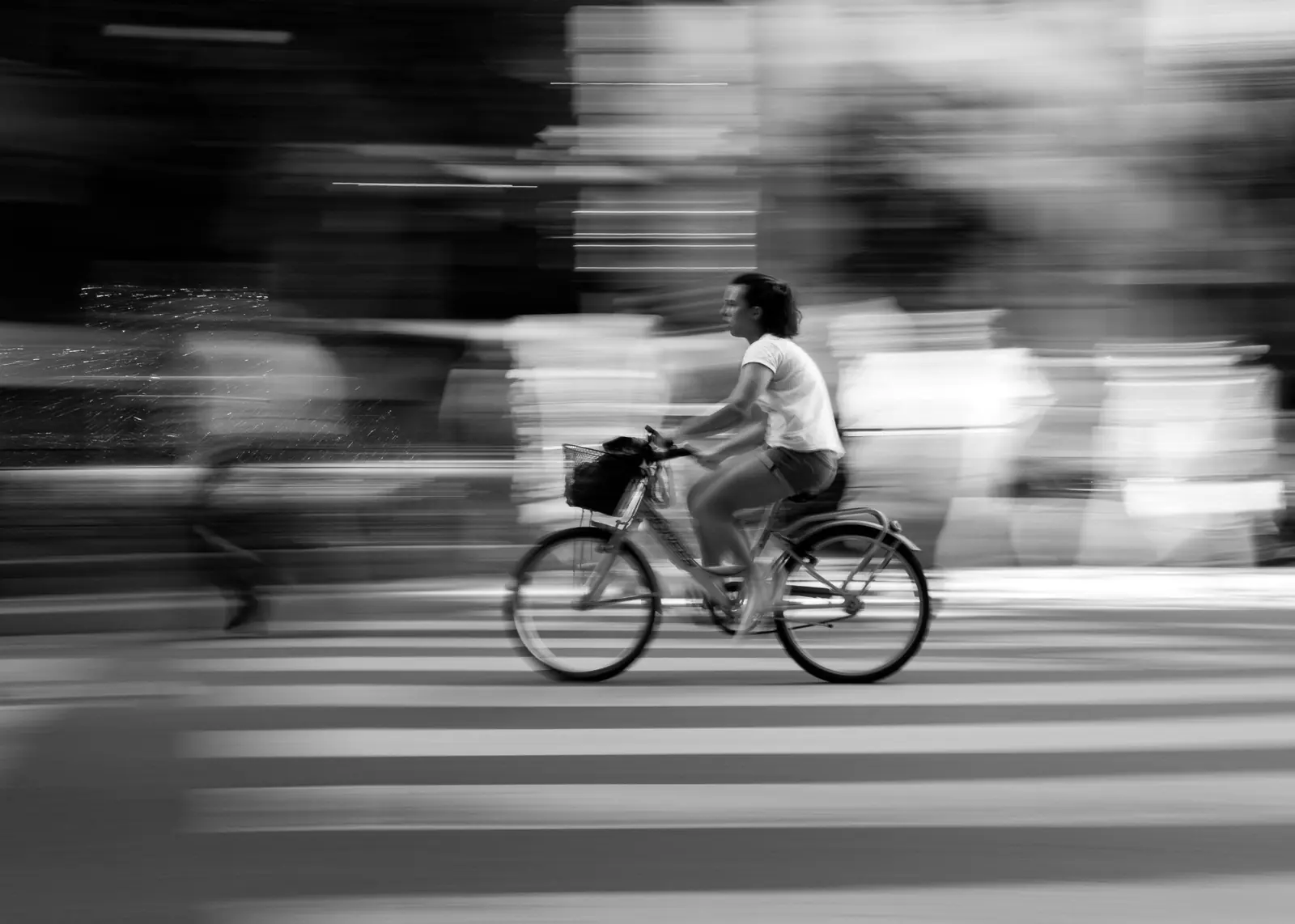 Person riding a bicycle through the city